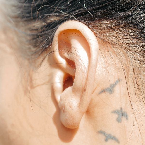 The ultimate guide to ear tattoos: Pain, placement, and care