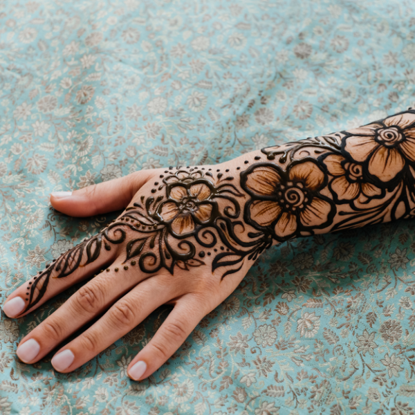 Ultimate guide to rose hand tattoos: Styles, meanings, and more