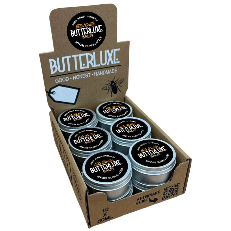 Butterluxe tattoo aftercare cola bottles balm available from Magnum Tattoo Supplies - display box front view